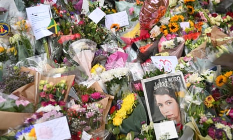 Flower tributes left outside Buckingham Palace after Queen Elizabeth's death.