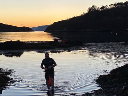 Bill Cowie leaves the water after going for a swim on Rona