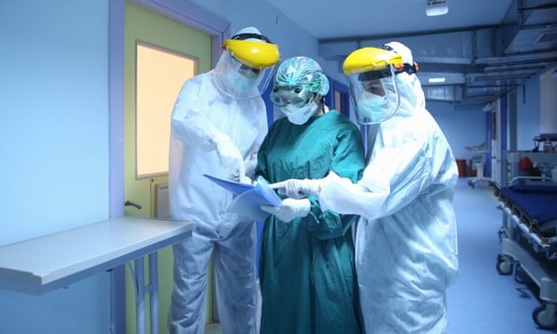 Frontline healthcare workers in Turkey wear protective suits, as infections continued to escalate globally.