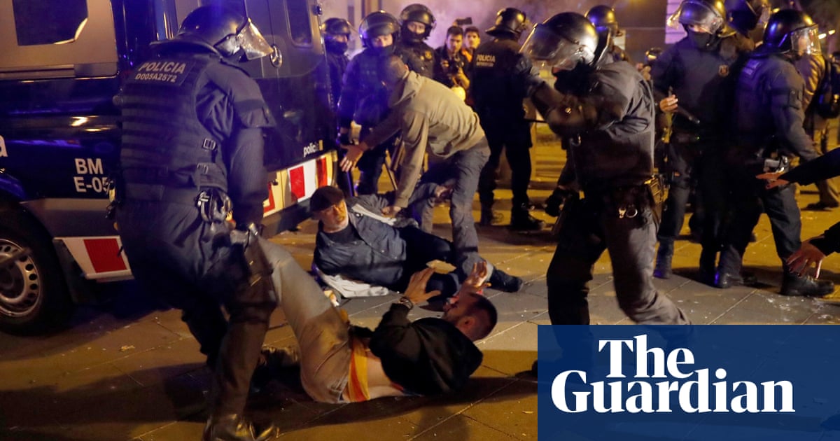 Dozens hurt as Catalonia independence protesters clash with police at Barcelona match