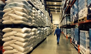 A worker walks in the warehouse of East End Foods in Birmingham, England.