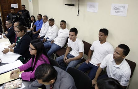 In an October 2018 photo, men accused in the murder of Berta Cáceres sit in the courtroom in Tegucigalpa, Honduras.