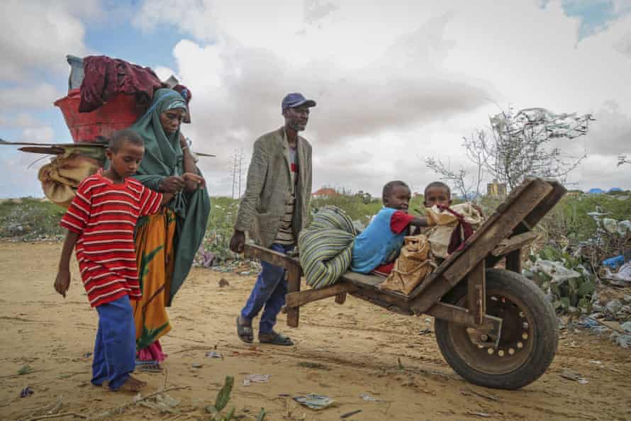 A family fleeing drought in Somalia arrive at a camp near Mogadishu last month. Mass migration is now likely ‘on an unprecedented scale’, the WFP warns.