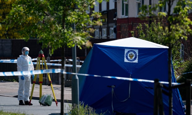 Forensics officer in College Road, Kingstanding, Birmingham, on Tuesday, where a 14-year-old died