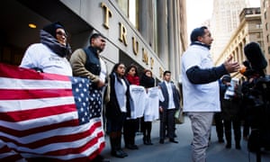 A group of immigrants and attorneys gather outside Trump Tower on 22 November to draw attention to Donald Trump’s proposed immigration policies.