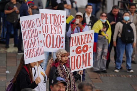 Demonstrators hold signs that read in English “We are a dignified and sovereign nation”, “Petro is not alone”, and “Yankees Go Home”.