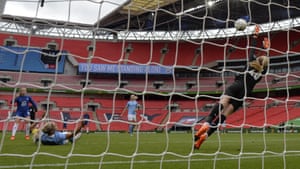 Chelsea’s Erin Cuthbert, far left, scores her side’s second