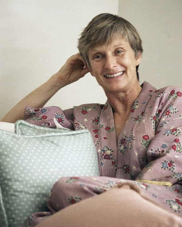 Cloris Leachman sitting on a sofa resting her head on one hand