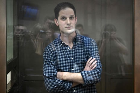 US journalist Evan Gershkovich, arrested on espionage charges, stands inside a defendants' cage before a hearing to consider an appeal on his arrest at the Moscow City Court.