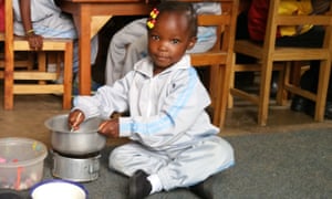 Joy plays in her nursery in Kibera, Nairobi.