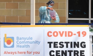 A healthcare worker is seen at a walk through Covid-19 testing site in Heidelberg West, Melbourne.