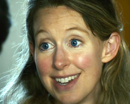 A close-up of a smiling Elizabeth Holmes.