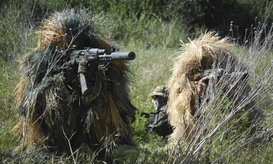 Ukrainian Territorial Defence Forces members train on the outskirts of Odesa, Ukraine.