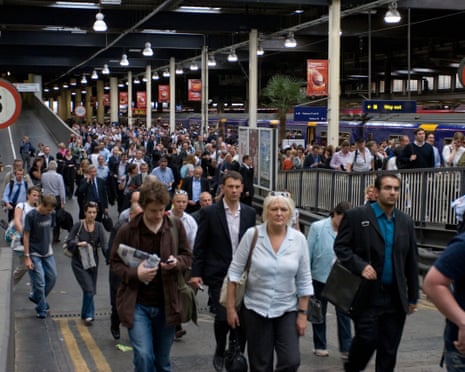 A crowd of commuters at Euston station