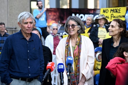 Tony Lonergan (left) and Wendy Wales (middle) speak to media following their win in the high court of Australia on 7 October.