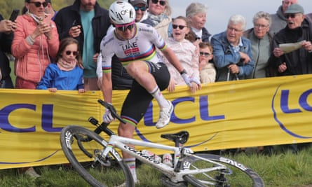Tadej Pogacar gets back up after a fall during Paris-Roubaix.