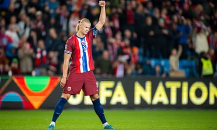 Erling Haaland celebrates after scoring his team’s second goal, an 80th-minute winner against Austria