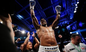 Anthony Joshua celebrates after winning the fight.