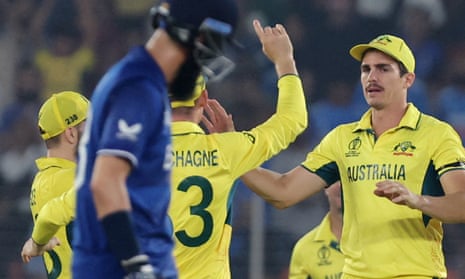 Australia's Sean Abbott celebrates with Marnus Labuschagne and teammates after taking the catch to dismiss England's Liam Livingstone, off the bowling of Pat Cummins.