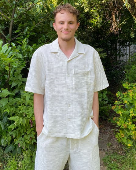 James Davies in short-sleeved white shirt