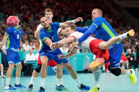 Denmark’s Mathias Gidsel shoots on goal during a handball match against Slovenia.