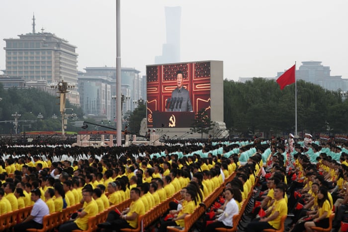 Chinese President Xi Jinping is seen on a giant screen as he delivers a speech at the event marking the 100th founding anniversary of the Communist Party of China, on Tiananmen Square in Beijing, China July 1, 2021.