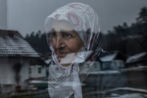 An elderly woman in her apartment in Jezevac refugee camp