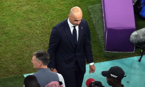 Belgium manager Roberto Martinez walks off dejected at the Al Thumama Stadium in Doha.