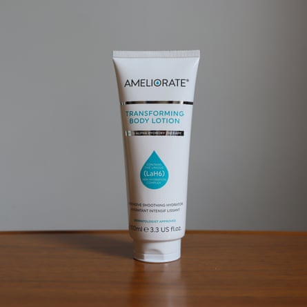 A squeezable tube of AMELIORATE Transforming Body Lotion