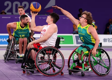 Lachlin Dalton attempts to block a shot by Abderrahim Taghrest during the 3x3 men’s wheelchair basketball semi-final match between England and Australia at the 2022 Commonwealth Games