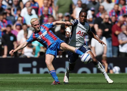 Will Hughes (left) tackles Tottenham’s Mathys Tel
