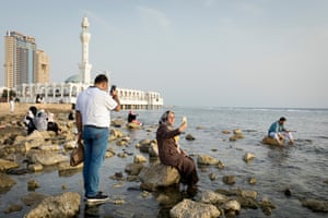 Tourists and visitors outside the Floating Mosque, also known as Masjid Al Rahma and Fatima Al Zahra Mosque, in the north Corniche area