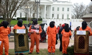 Protestors mark 18th anniversary of Guantánamo Bay detention camp and call for its closure and ‘accountability for torture’ near the White House, on 11 January.