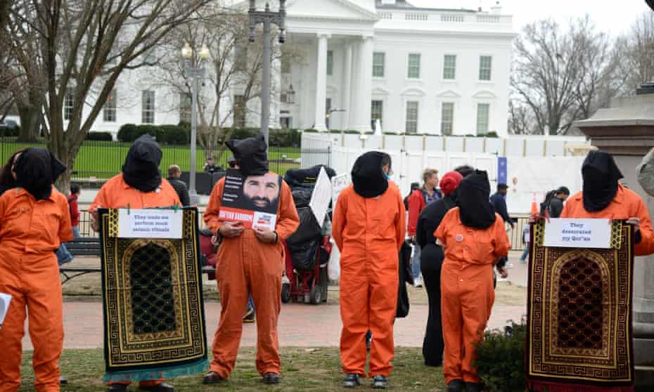 Protestors mark 18th anniversary of Guantánamo Bay detention camp and call for its closure and ‘accountability for torture’ near the White House, on 11 January.