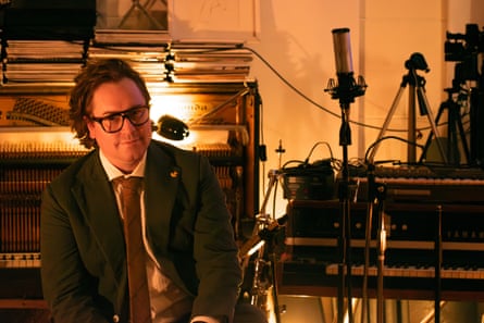 Joff Bush in a studio with instruments, microphones and so on in the background