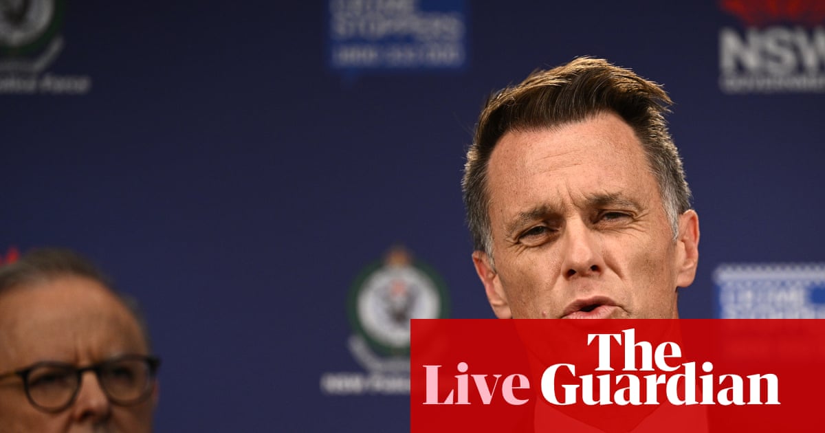 Bondi beach shooting live: Minns defends response of officers ‘shot in the front’ as police say alleged gunmen had Isis flags in their car and had visited Philippines