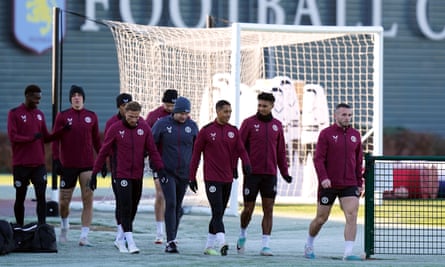 Aston Villa players arrive for training.