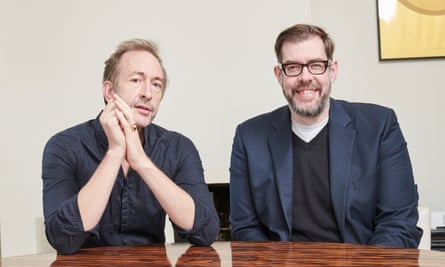 Richard Osman and his brother, Mat, sitting at a table
