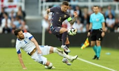 Kieran Trippier, England’s captain and stand-in left-back, vaults a tackle from Bosnia and Herzegovina’s Ermin Bicakcic