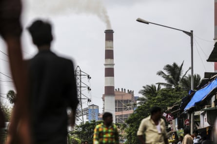 Smoke rises from a chimney at the Tata Power Co Trombay Thermal power station in Mumbai, India, in August 2017.
