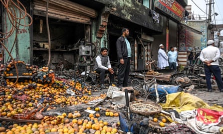 Burnt out shops in Delhi after the riots.