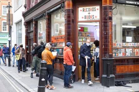 Queues outside The Sounds of the Universe record shop on Record Store Day in Soho, London.