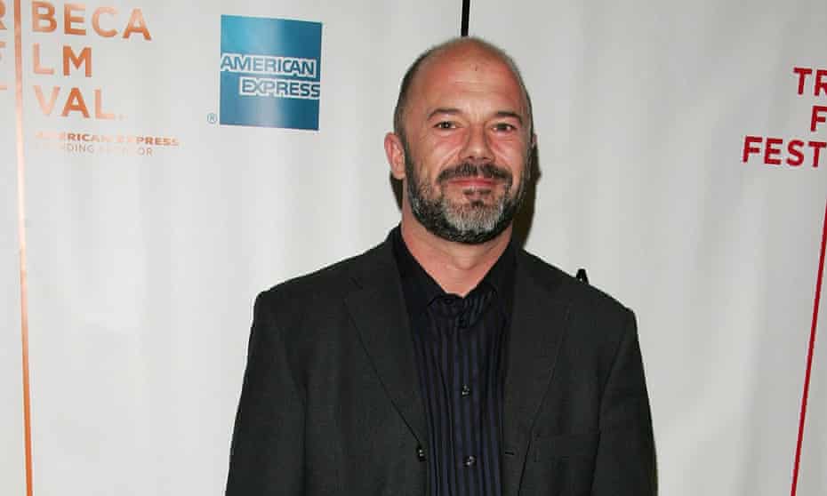 Andrew Sullivan on the red carpet at an awards ceremony.