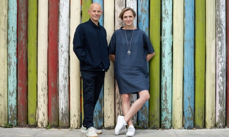Daniel Evans and Tamara Harvey, the RSC’s artistic directors in front of multi-coloured poles