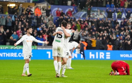 Swansea celebrate their dramatic win over Forest