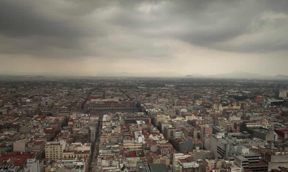 A storm gathers over Mexico City.