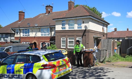 Police officers at a property in Shiregreen, Sheffield, on Friday.
