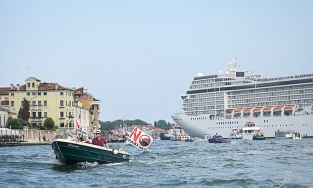 Activists in Venice protesting against cruise ships as the MSC Orchestra left the city from the Giudecca Canal earlier this month.