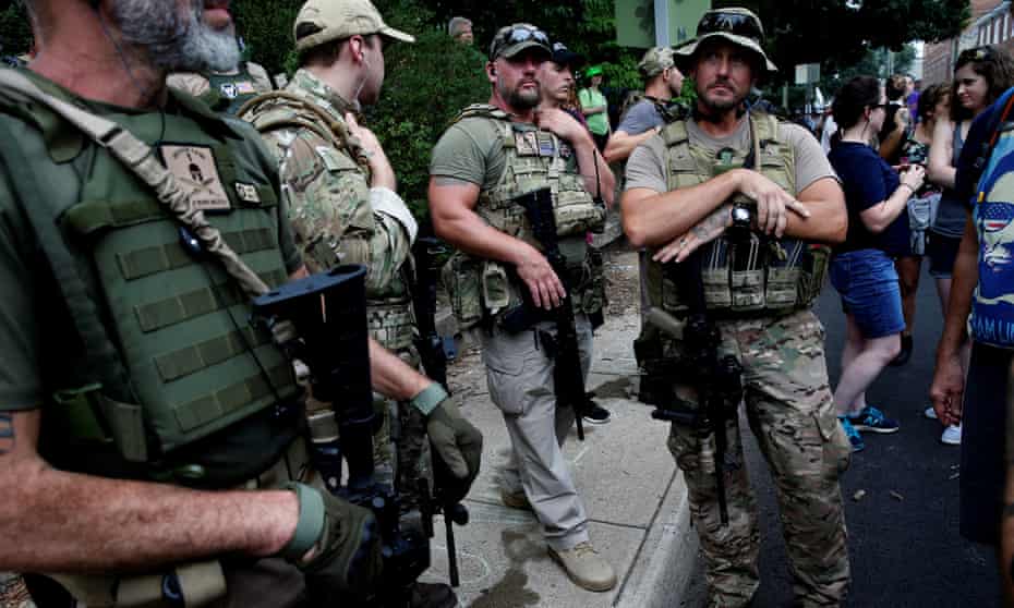 Members of a militia stand near a rally in Charlottesville, Virginia, this past weekend.
