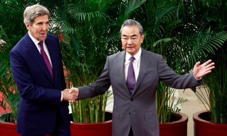 US climate envoy John Kerry is greeted by top Chinese diplomat Wang Yi before a meeting in the Great Hall of the People on 18 July 2023 in Beijing, China.